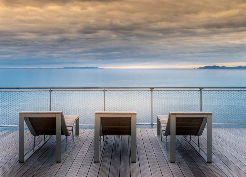 outdoor lounge chairs, patio, sea